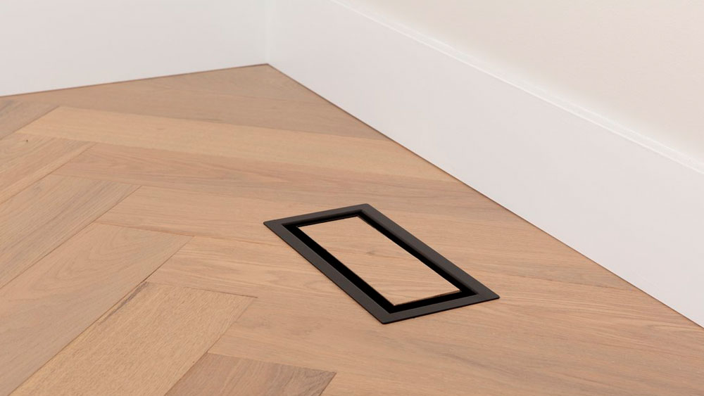 Aria OG floor register showing a seamless and modern way to integrate your floor air registers into your custom flooring finish