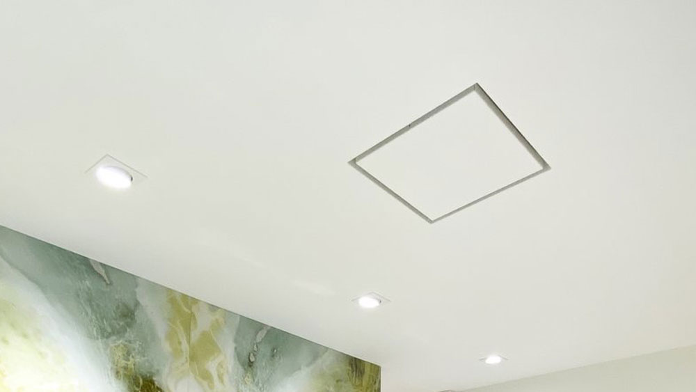 Aria Drywall Pro X - Exhaust fan and air return covers showing a seamless smooth finish customized to match your walls and ceilings.