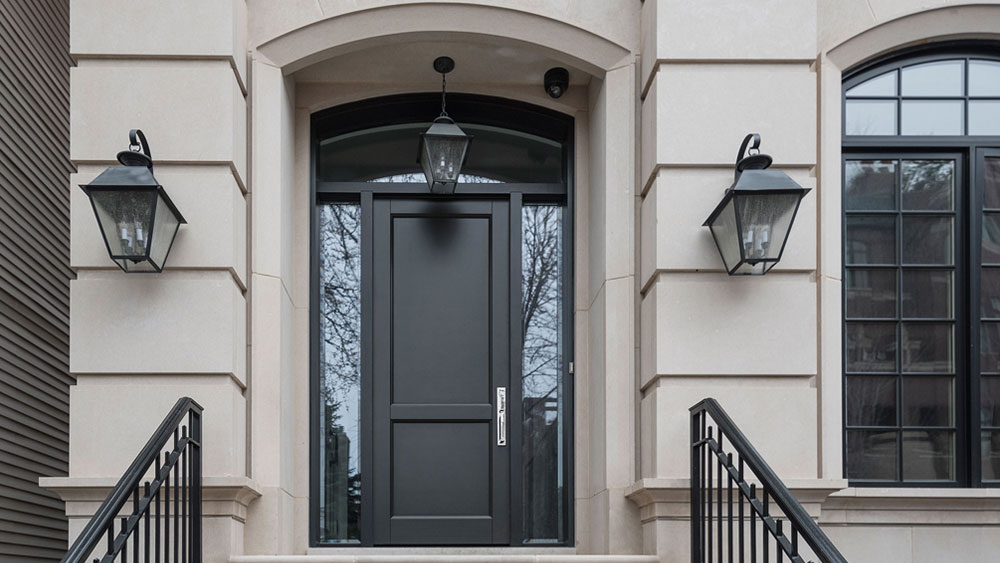 Single entry, modern solid wood door with full undivided sidelites and transom shows that an entry door doesn't have to be big to be impressive.