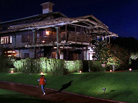 Marty McFly running up the driveway of the 3-story arts and crafts style Gamble House, used as the set for the home of Doc Brown in Back to the Future