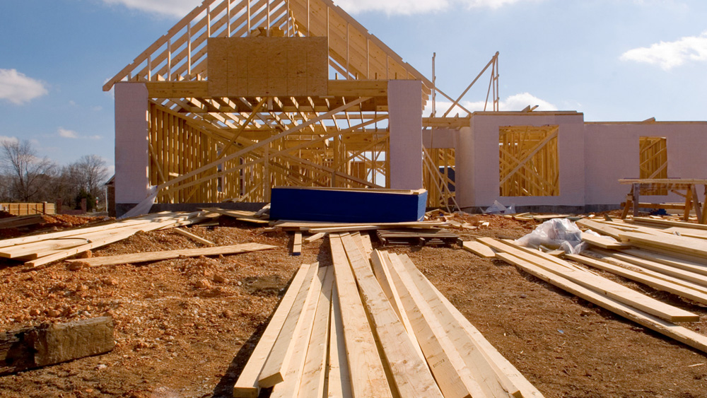 A 2-story wood frame house under construction halted by the COVID-19 global pandemic