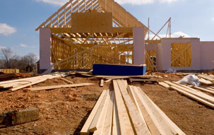 A 2-story wood frame house under construction halted by the COVID-19 global pandemic