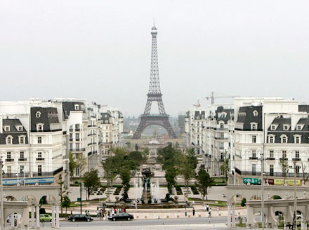 A 354-foot replica of the Eiffel Tower standing in the background of Shanghai's attempt to replicate the city of Paris, France