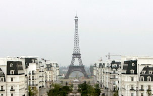 A 354-foot replica of the Eiffel Tower standing in the background of Shanghai's attempt to replicate the city of Paris, France