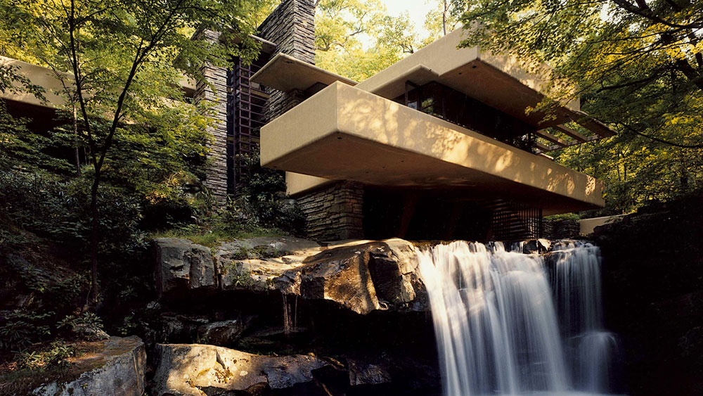 The exterior and waterfall of Frank Lloyd Wright's Fallingwater in Bear Run, PA