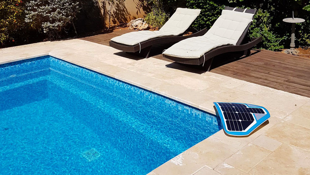 The Coral Manta 3000 placed on the edge of a sunny pool for 24/7 underwater safety monitoring.