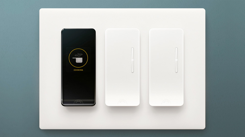 Noon Home modules setup in a 3 slot face plate, including one Room Director and two Extension dimmer switches